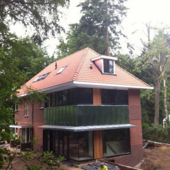 Woonhuis Bilthoven - Walsblank zink, staande fels